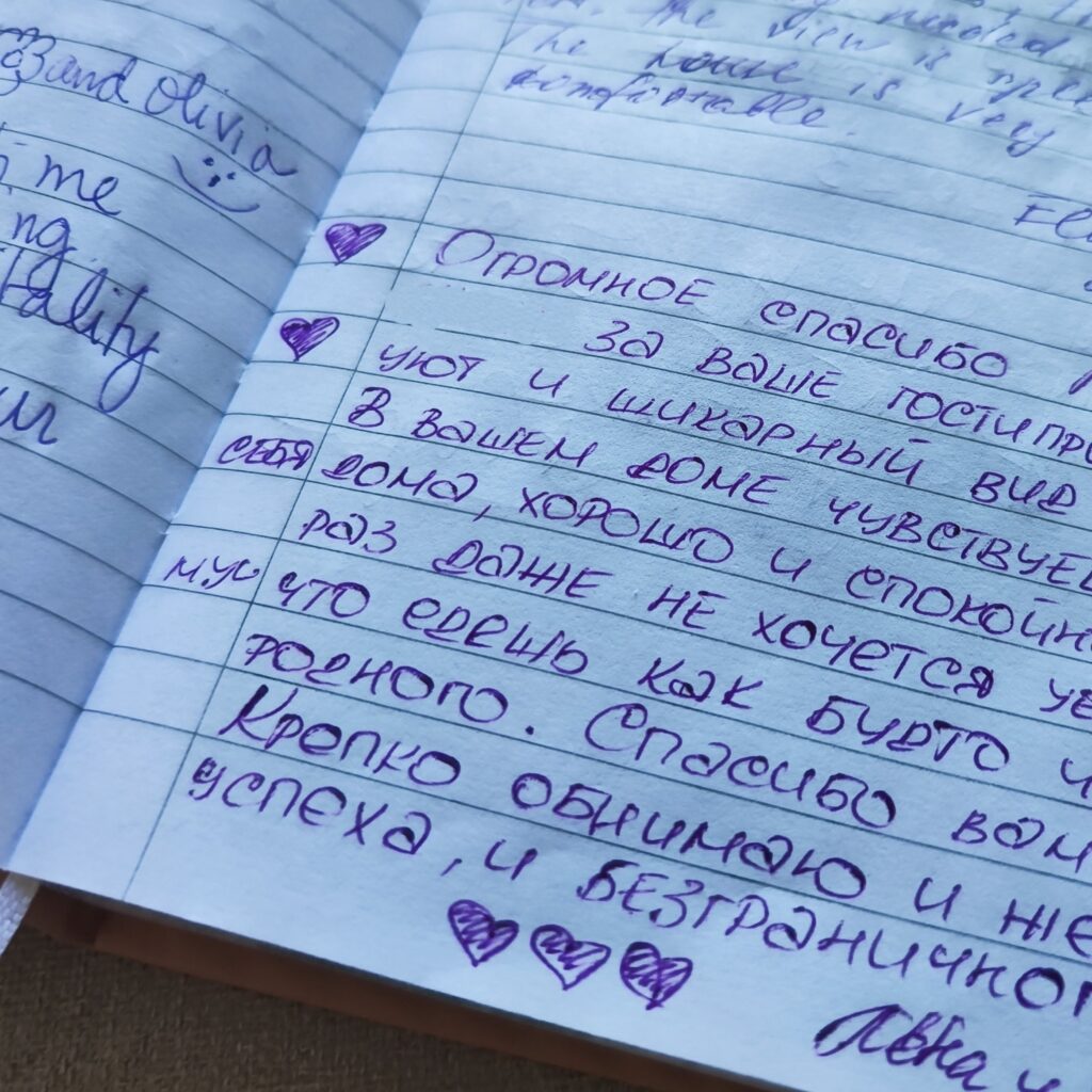 Guestbook note in Russian thanking the hosts for the beautiful view, comfort and peaceful sleep